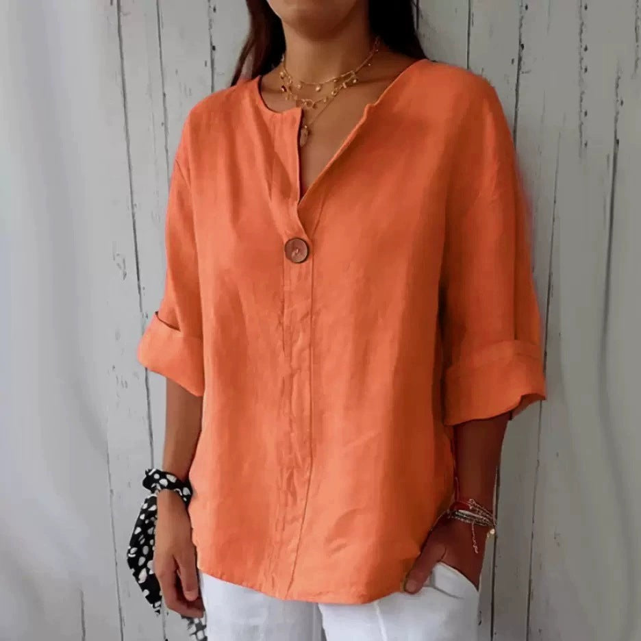 Relaxed button-neck blouse in orange