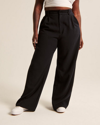 Pleated tailored trousers in black, front view