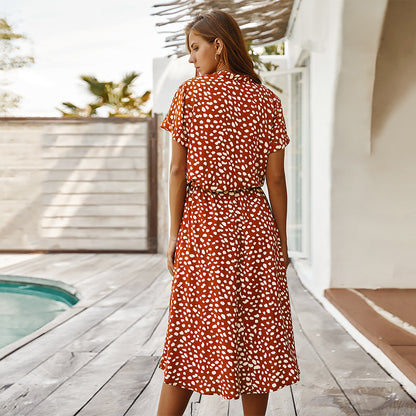 Back view of the collared midi dress in orange