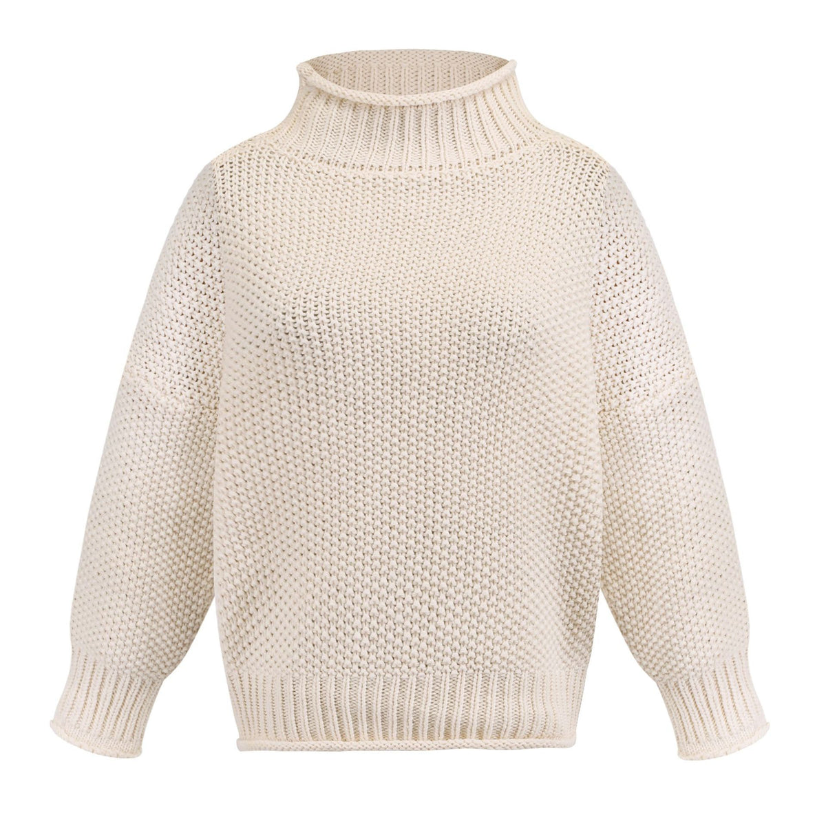 Chunky turtleneck sweater laid flat in cream