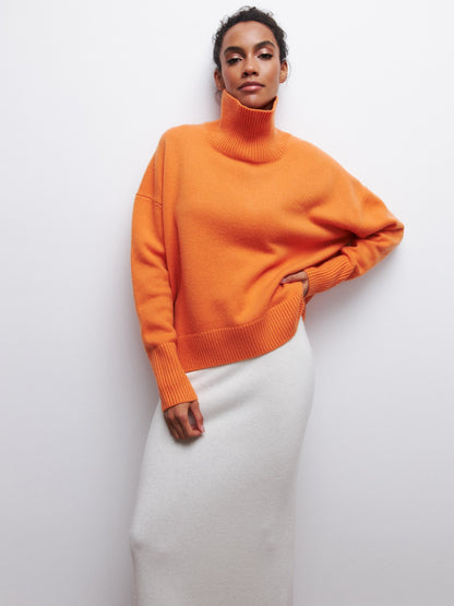 Relaxed turtleneck sweater in orange red