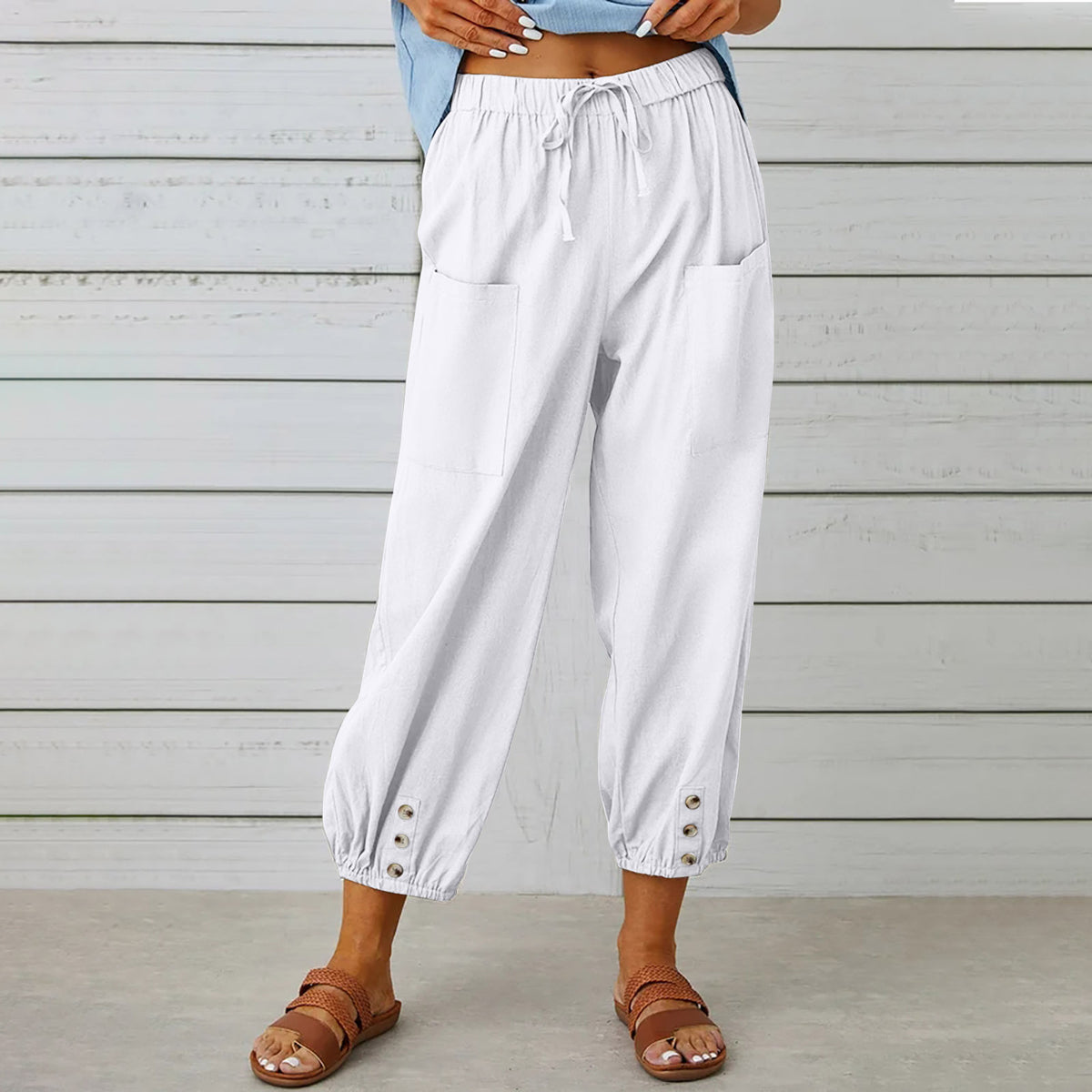 Drawstring tapered trousers in white