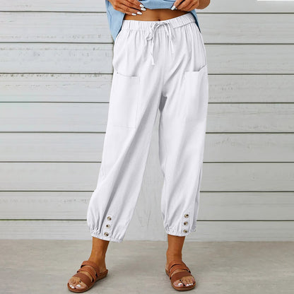 Drawstring tapered trousers in white