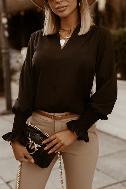 Cuff-detail V-neck blouse in black