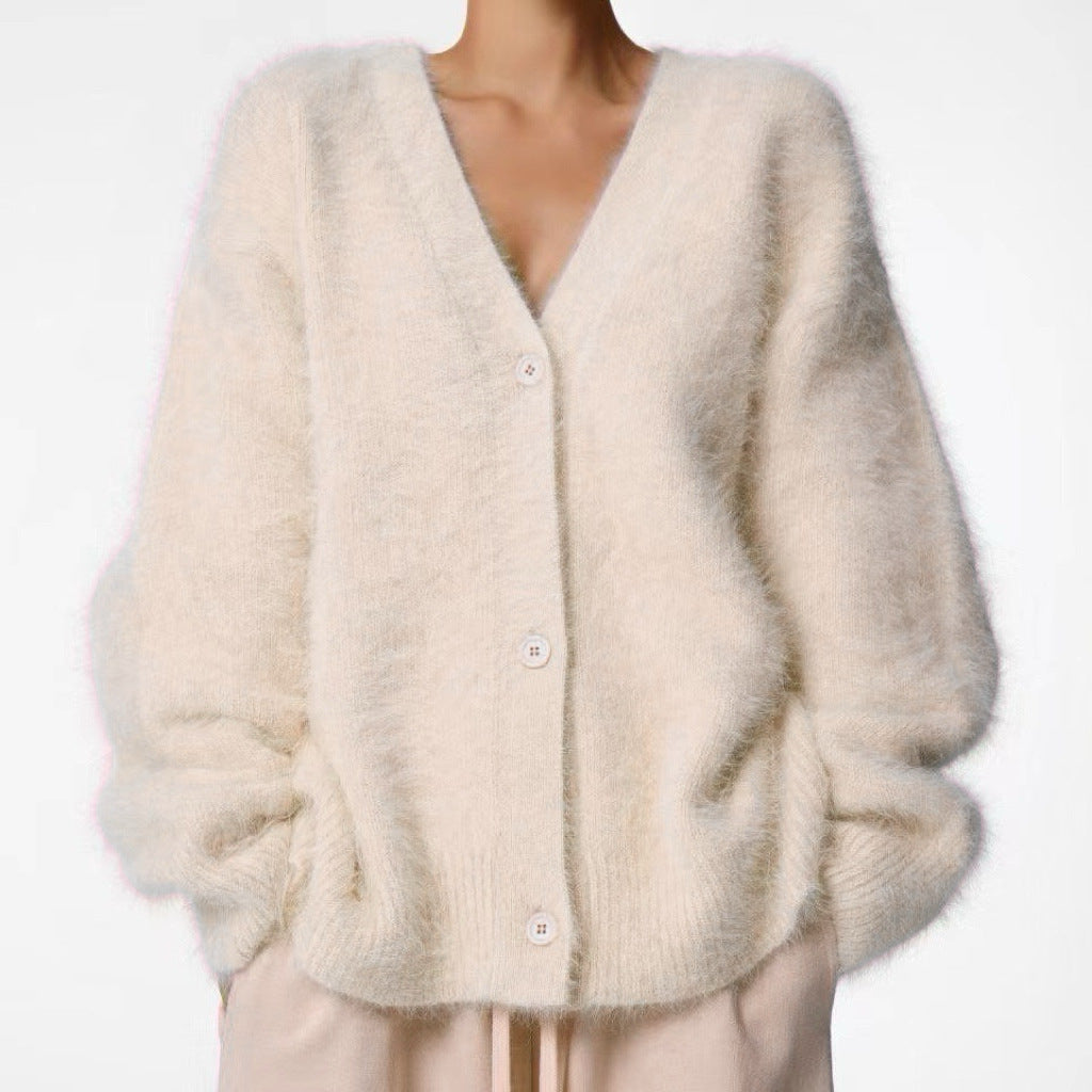 Textured V-neck cardigan in apricot, front view