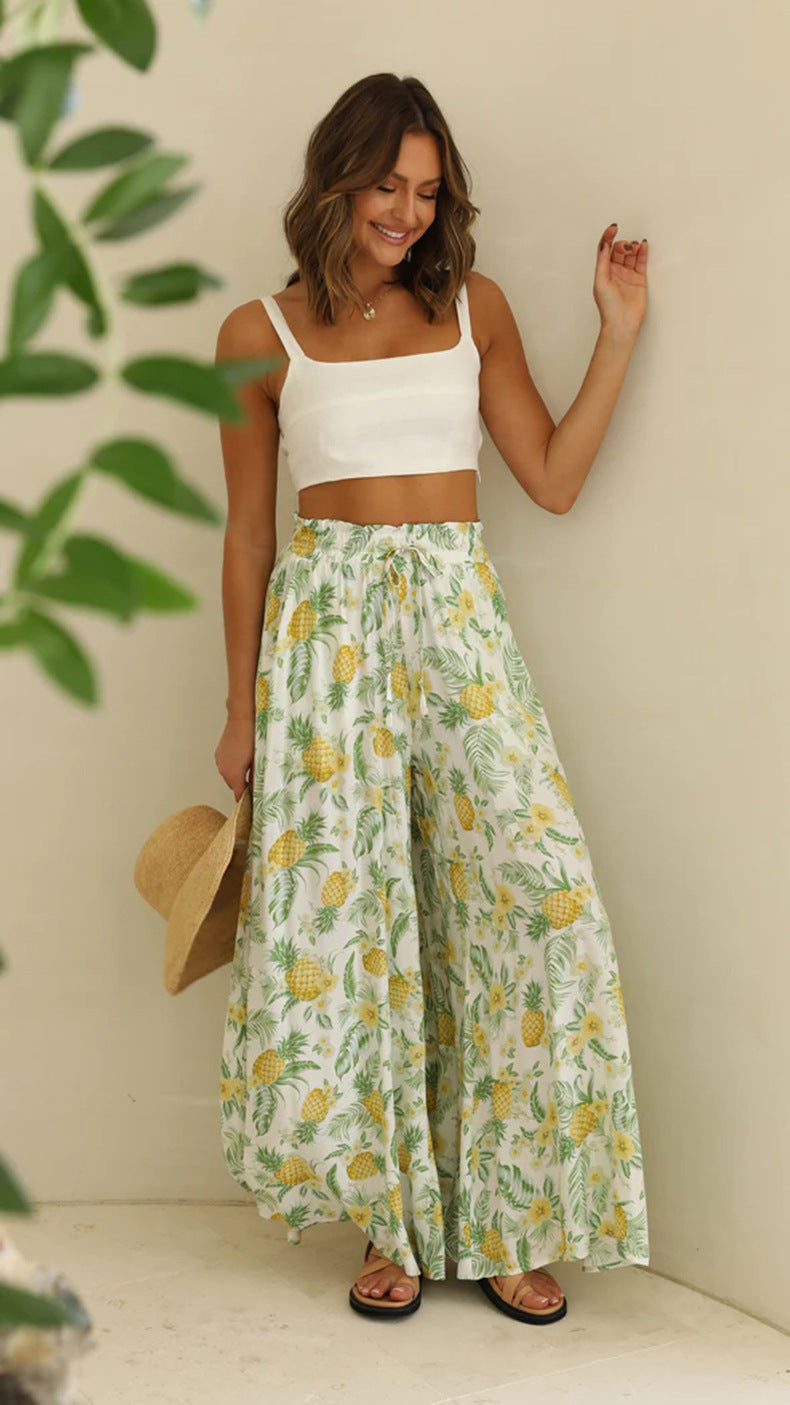 Flowing wide-leg drawstring trousers in a pineapple print