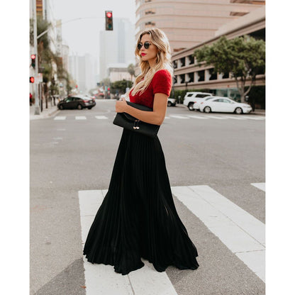 Long flowing maxi skirt in black, walking
