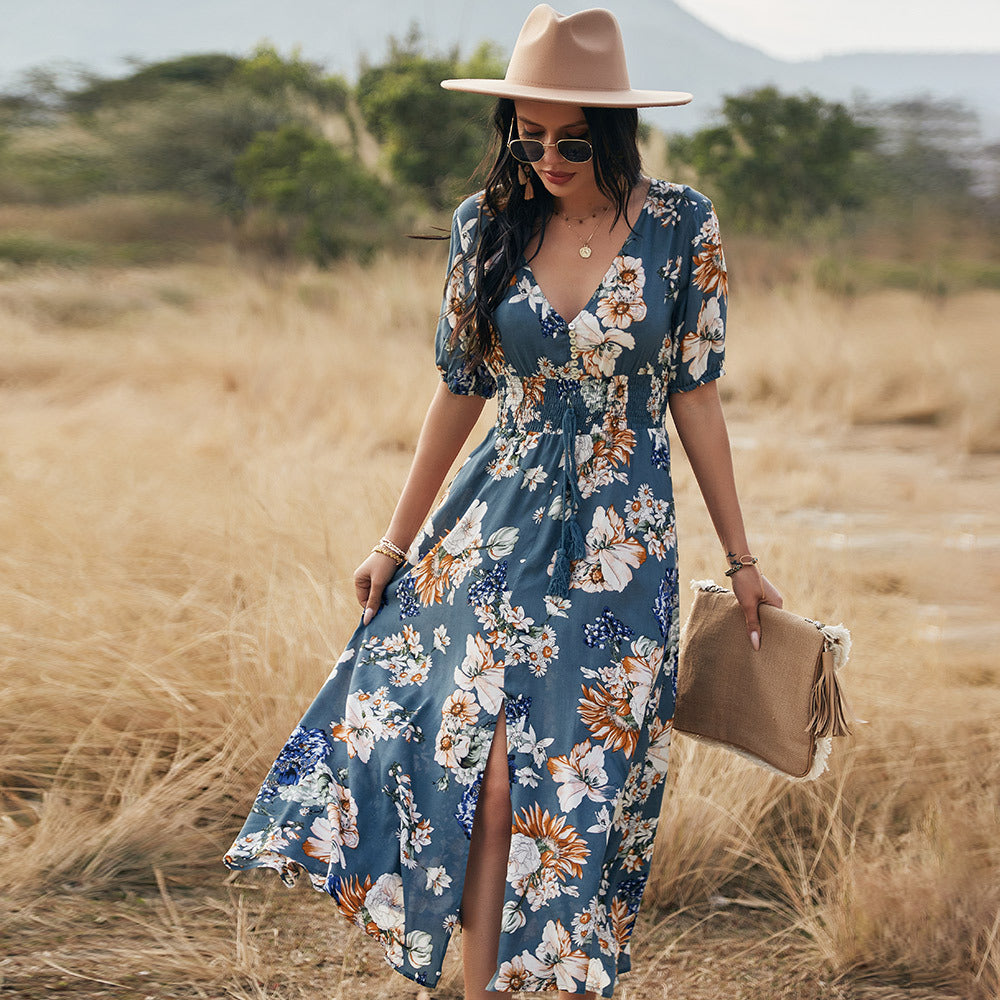 Floral V-neck day dress with a blue ground print