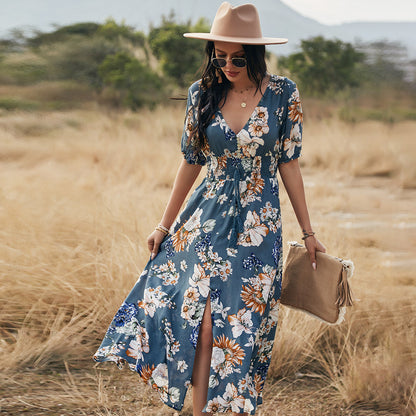 Floral V-neck day dress with a blue ground print