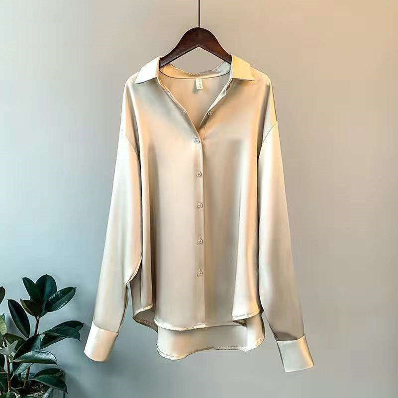Satin-effect button-up shirt in champagne on a hanger