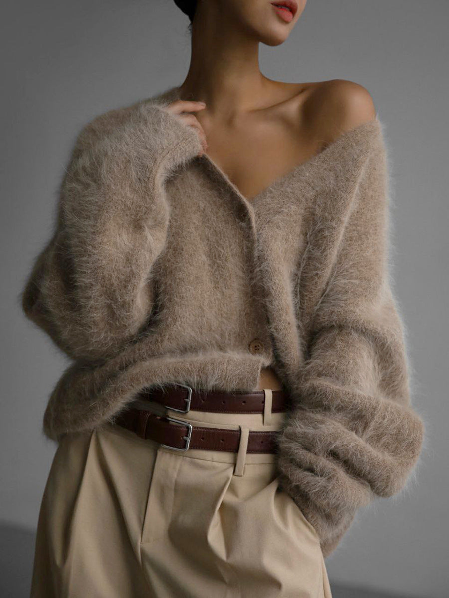 Textured V-neck cardigan in taupe worn with a belt and trousers