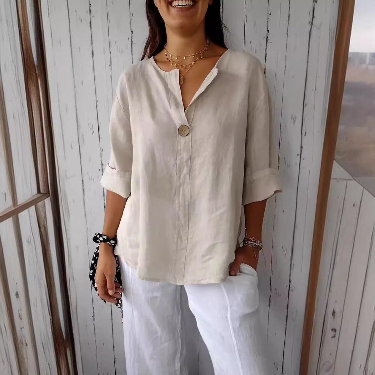 Relaxed button-neck blouse in apricot