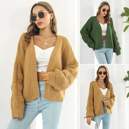 Balloon-sleeve cardigan in mustard yellow with an inset in army green