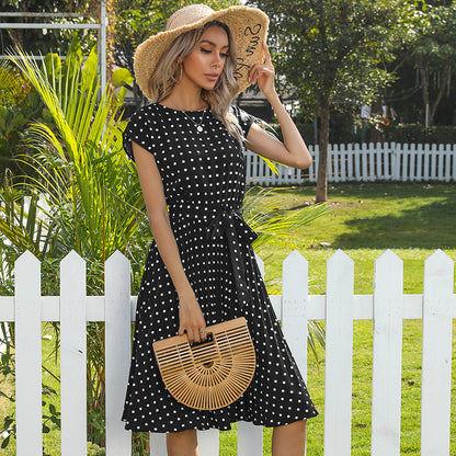 Polka-dot pleated midi dress in black