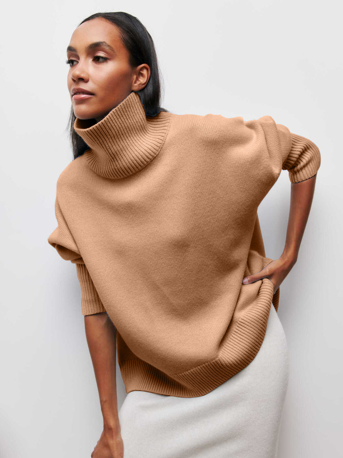 Relaxed turtleneck sweater in camel, front view