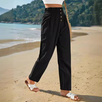 Button-front tapered trousers in black, walking